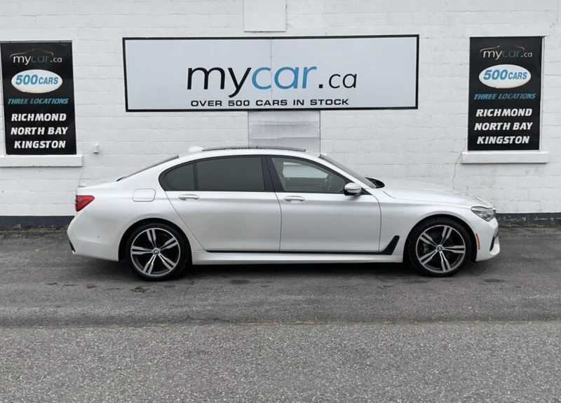 BMW 750 LONG* M-pack* HARMAN/KARDON* ОБДУХ* МОНИТОРИ* PANO, снимка 3 - Автомобили и джипове - 52753108