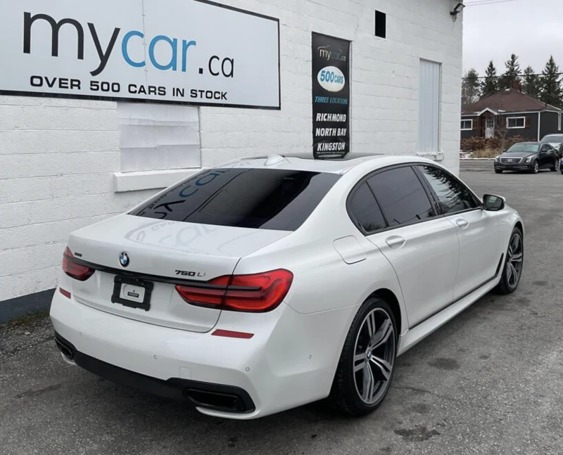 BMW 750 LONG* M-pack* HARMAN/KARDON* ОБДУХ* МОНИТОРИ* PANO, снимка 4 - Автомобили и джипове - 52753108