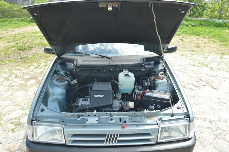 Fiat Uno 1.0 45S, снимка 13 - Автомобили и джипове - 53184055