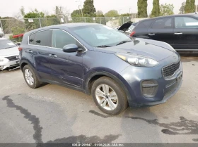 Kia Sportage 2.4L I-4 DI, DOHC, VVT, 181HP Front Wheel Drive 1