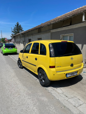 Opel Meriva, снимка 1 - Автомобили и джипове - 45653398