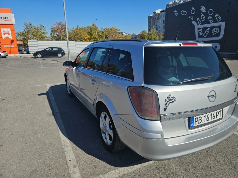 Opel Astra, снимка 7 - Автомобили и джипове - 47741043