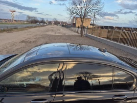BMW 750 5.0, снимка 17