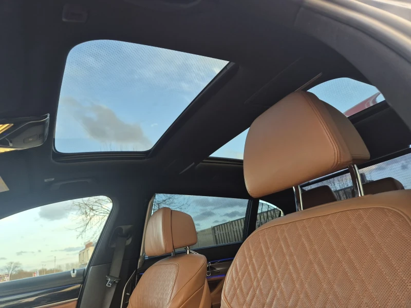 BMW 750 5.0, снимка 15 - Автомобили и джипове - 53012914