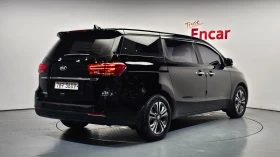 Kia Carnival DELUXE 2.2/ПОДГРЕВ-СЕДАЛКИ/РЕАЛНИ КМ/hellascars.bg, снимка 2