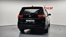 Kia Carnival DELUXE 2.2/ПОДГРЕВ-СЕДАЛКИ/РЕАЛНИ КМ/hellascars.bg, снимка 4