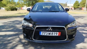 Обява за продажба на Mitsubishi Lancer 1.6  2-РИ КОМПЛЕКТ ГУМИ и ДЖАНТИ ~12 500 лв. - изображение 1