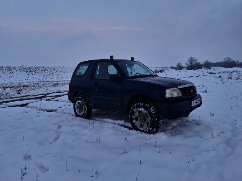 Suzuki Grand vitara Повдигната , снимка 3 - Автомобили и джипове - 52978316