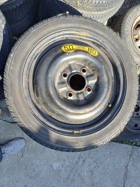 Гуми с джанти Continental 145/65R15, снимка 1 - Гуми и джанти - 46531850