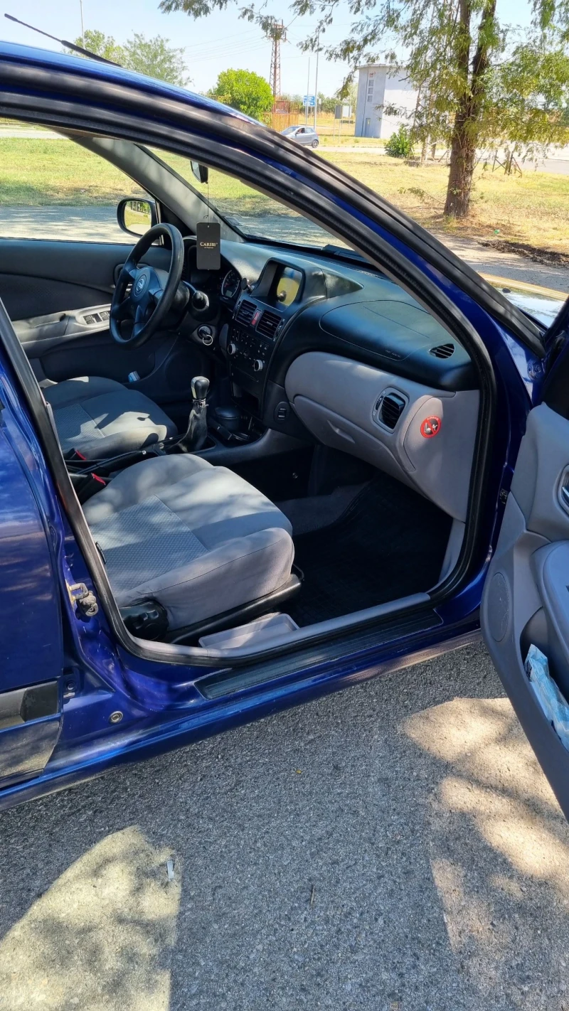 Nissan Almera, снимка 7 - Автомобили и джипове - 51239608