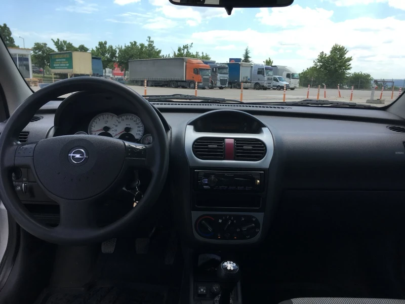 Opel Corsa 1.2 16v Twinport, снимка 7 - Автомобили и джипове - 52517448