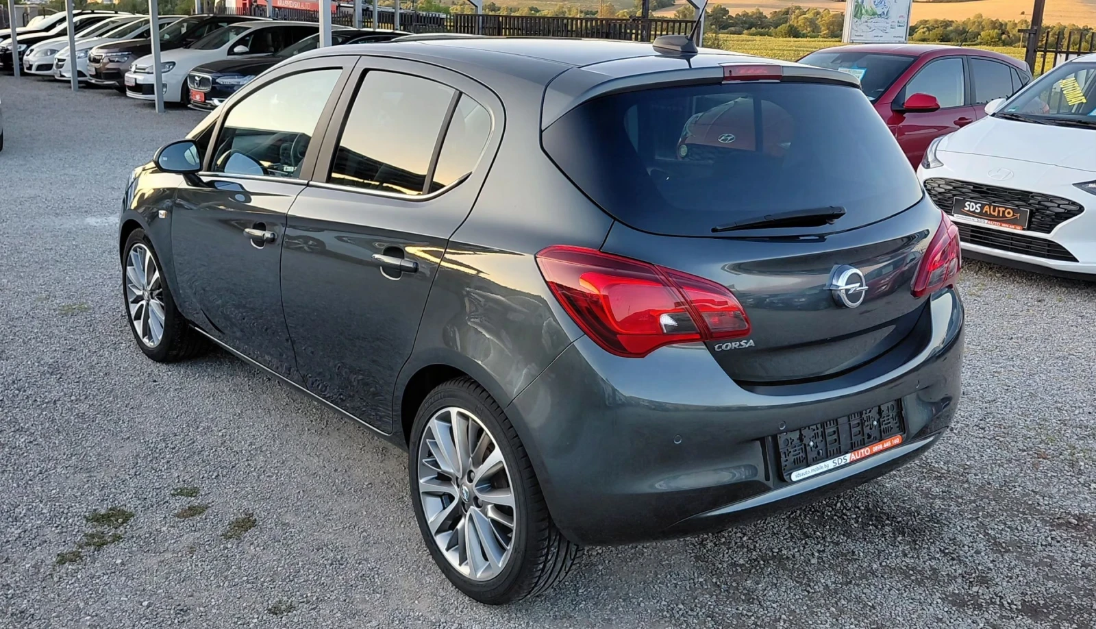 Opel Corsa AUTOMAT, 1.4i, NAVI, BI XENON, servicebuch, лизинг, снимка 7 - Автомобили и джипове - 55465047