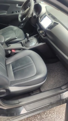 Kia Sportage 2.0i/АВТОМАТ/4X4, снимка 12 - Автомобили и джипове - 54552693