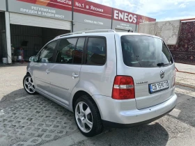 VW Touran 2, 0 TDI / КОЖА / ПОДГРЕВ / АВТОМАТИК - 7950 лв. - 75971038 2