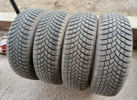 Гуми Зимни 195/65R15, снимка 1 - Гуми и джанти - 48803720