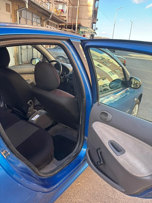 Peugeot 206, снимка 10 - Автомобили и джипове - 52834482