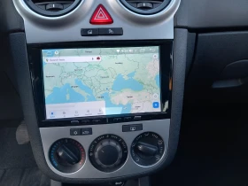 Opel Corsa 1.4 Facelift AC, снимка 13 - Автомобили и джипове - 53385982