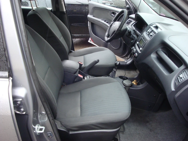 Kia Sportage 2.0ГАЗ-БЕНЗИН, снимка 7 - Автомобили и джипове - 52034945