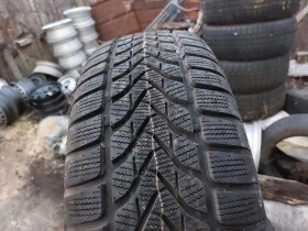 Гуми Зимни 205/65R15, снимка 1 - Гуми и джанти - 39385821