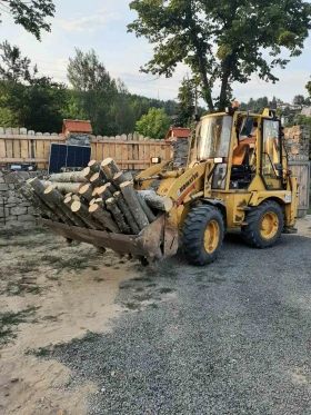  Komatsu WB70A | Mobile.bg    13