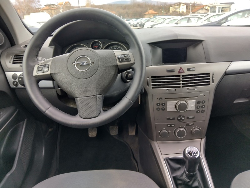 Opel Astra 1.3 CDTI 90кс 6ск., снимка 9 - Автомобили и джипове - 45524162