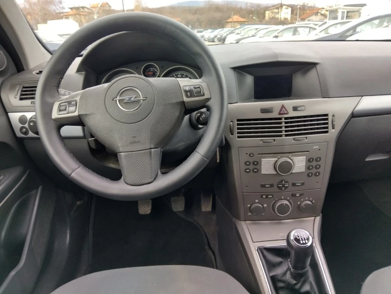 Opel Astra 1.3 CDTI 90кс 6ск., снимка 9 - Автомобили и джипове - 47799961