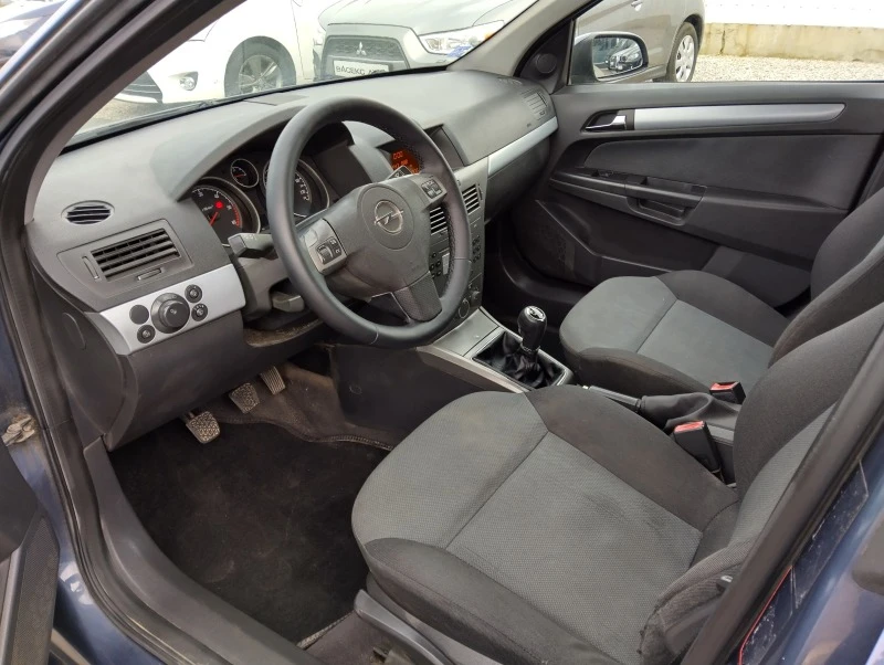 Opel Astra 1.3 CDTI 90кс 6ск., снимка 8 - Автомобили и джипове - 47799961