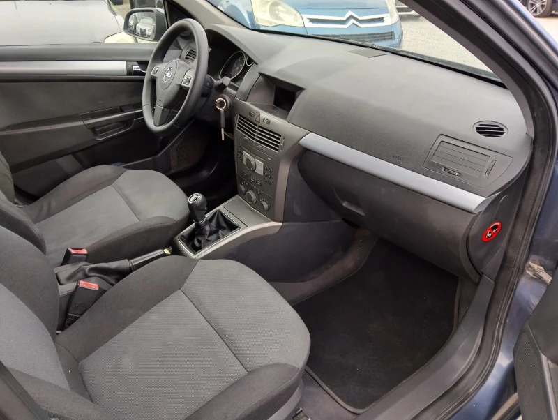 Opel Astra 1.3 CDTI 90кс 6ск., снимка 10 - Автомобили и джипове - 47799961