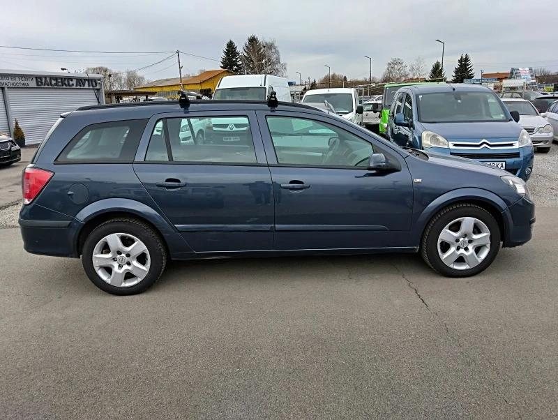 Opel Astra 1.3 CDTI 90кс 6ск., снимка 6 - Автомобили и джипове - 47799961