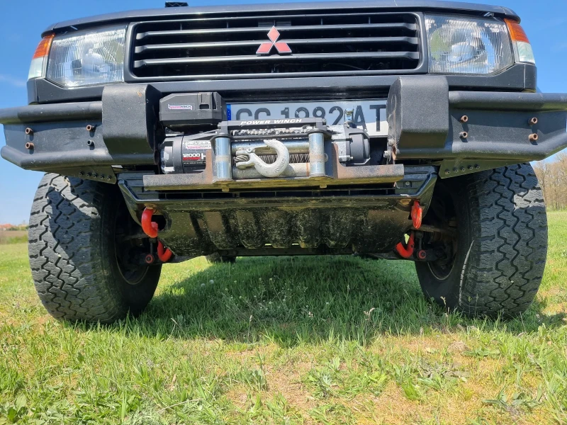 Mitsubishi Pajero GLS Super Select 2.8 125кс, снимка 14 - Автомобили и джипове - 52437103