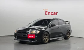 Mitsubishi Lancer * EVO X* brembo* JR* twin Clutch SST* AYC* подгрев