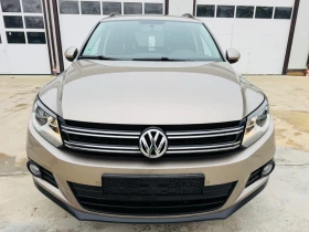 VW Tiguan * 2.0TDI* FACE* NAVI*  - 18450 лв. / 9433.34 € - 94992035 2