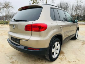 VW Tiguan * 2.0TDI* FACE* NAVI*  - 18450 лв. / 9433.34 € - 94992035 7
