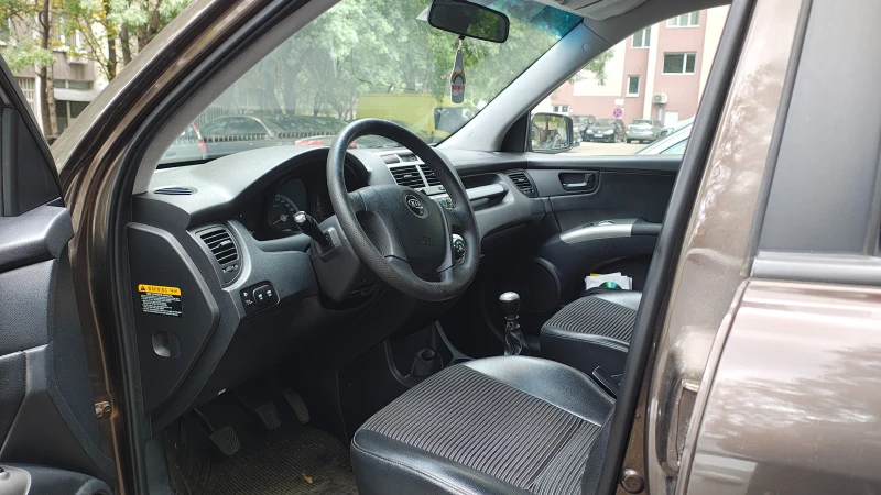 Kia Sportage, снимка 7 - Автомобили и джипове - 53389610