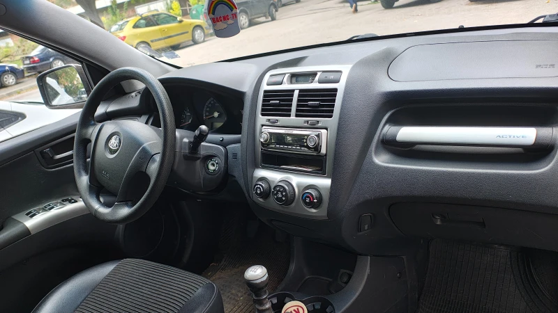 Kia Sportage, снимка 9 - Автомобили и джипове - 53389610