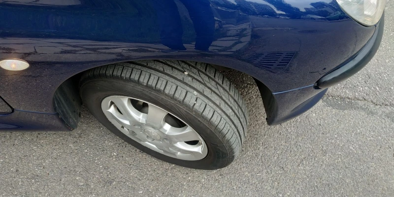 Peugeot 206, снимка 7 - Автомобили и джипове - 52513459