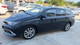 Toyota Auris 1.8i* Facelift Hybrid* Navi* Koja* Full* , снимка 3