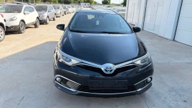 Toyota Auris 1.8i* Facelift Hybrid* Navi* Koja* Full*  - 8650 € / 16917.93 лв. - 16024534 11
