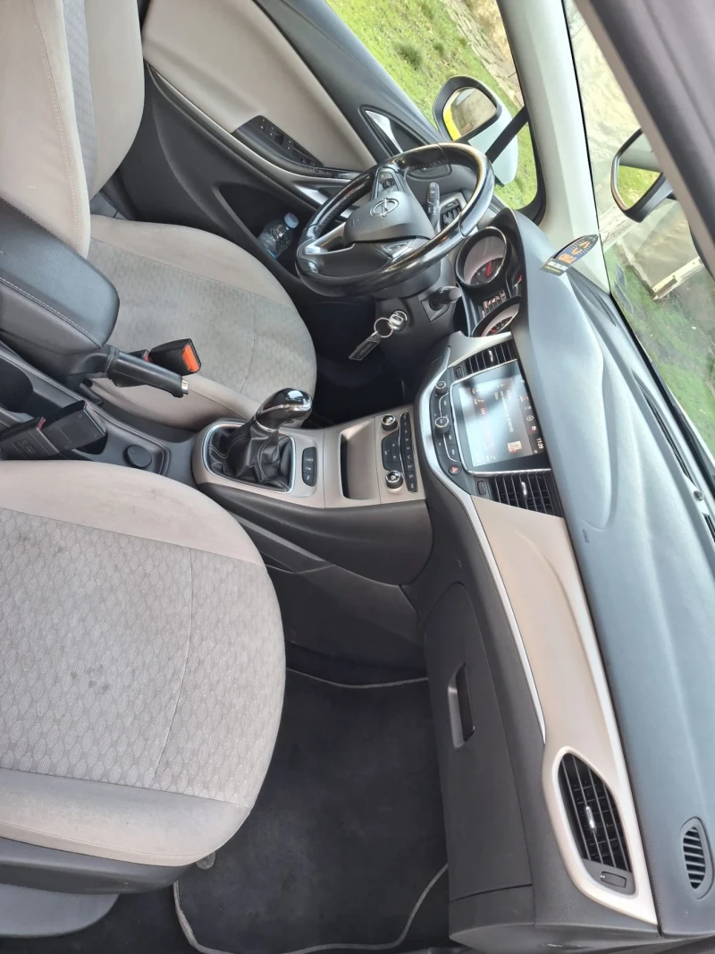Opel Astra, снимка 12 - Автомобили и джипове - 52919600