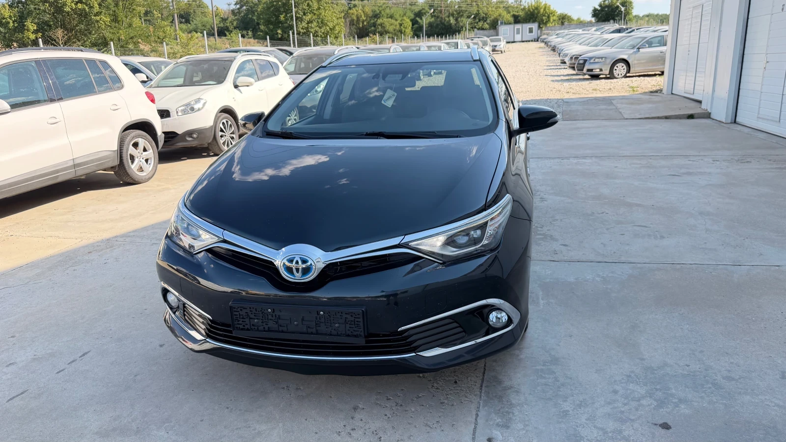 Toyota Auris 1.8i* Facelift Hybrid* Navi* Koja* Full* , снимка 1 - Автомобили и джипове - 55548693