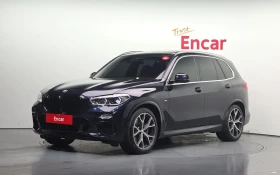 BMW X5 HARMAN* ВЪЗДУХ* LASER* ОБДУХ* ЩОРИ* AMBIENT* HUD* , снимка 1