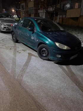������ Peugeot 206