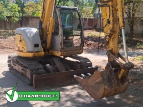 Багер New Holland E70SR-1ES 