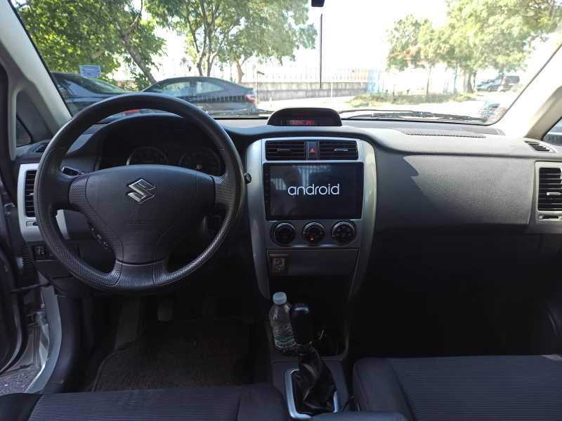 Suzuki Liana, снимка 8 - Автомобили и джипове - 52473155