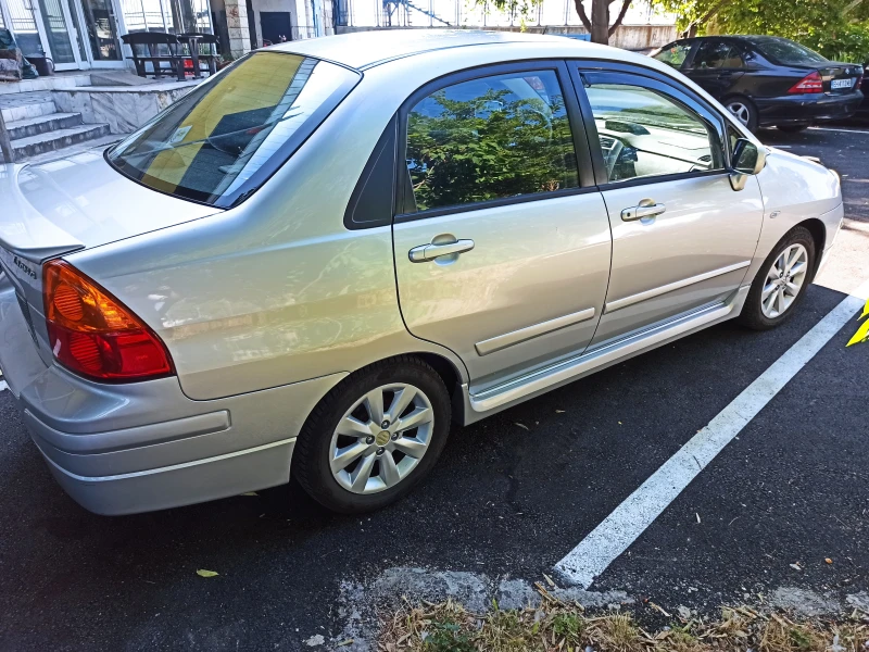 Suzuki Liana, снимка 3 - Автомобили и джипове - 52473155