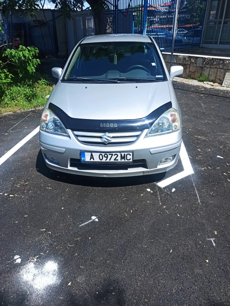 Suzuki Liana, снимка 14 - Автомобили и джипове - 53239328