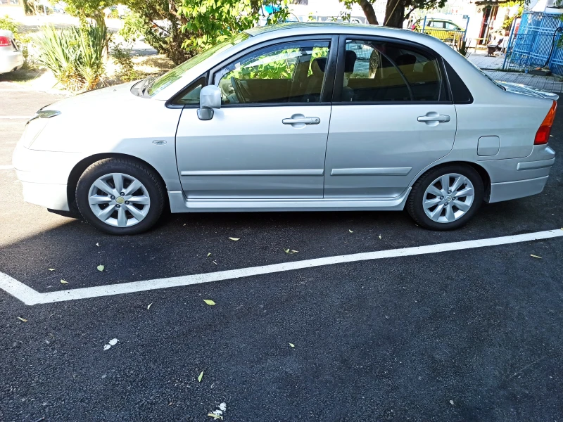 Suzuki Liana, снимка 4 - Автомобили и джипове - 52473155