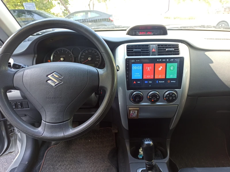 Suzuki Liana, снимка 10 - Автомобили и джипове - 52473155