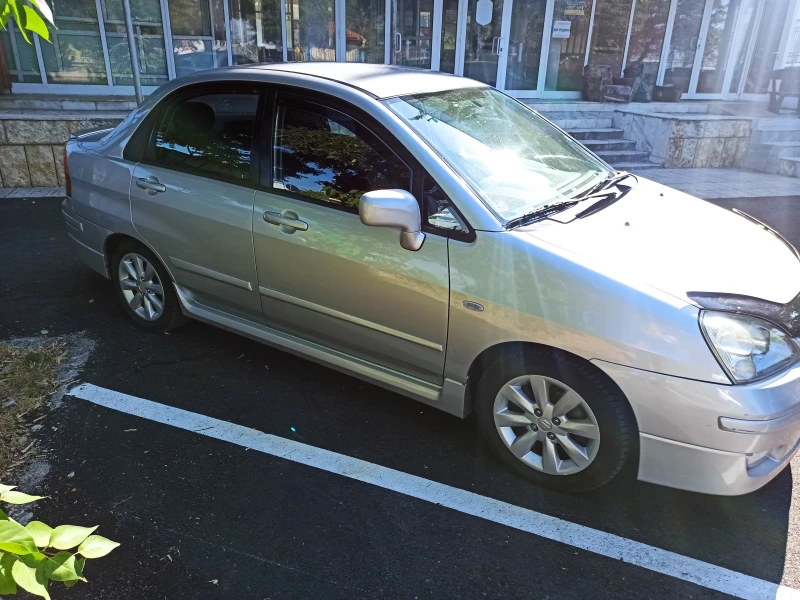 Suzuki Liana, снимка 5 - Автомобили и джипове - 52473155