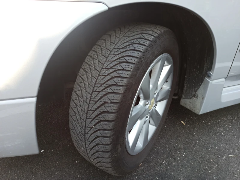 Suzuki Liana, снимка 12 - Автомобили и джипове - 52473155